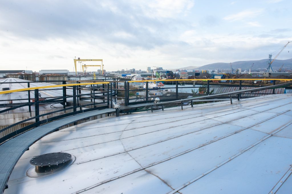 View from the top of the tank at Tennants Bitumen with the H&W cranes in the distance at Belfast Harbour