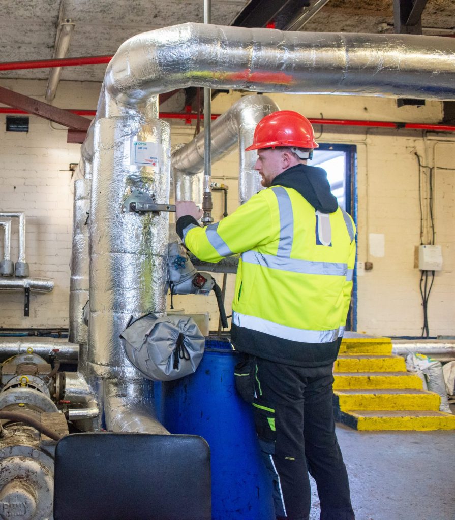 employee at tennants bitumen in the pump house